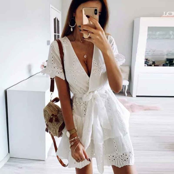 BellanBlue Dresses & Skirts - Boho White Eyelet Surplice Tie Ruffle Mini Dress